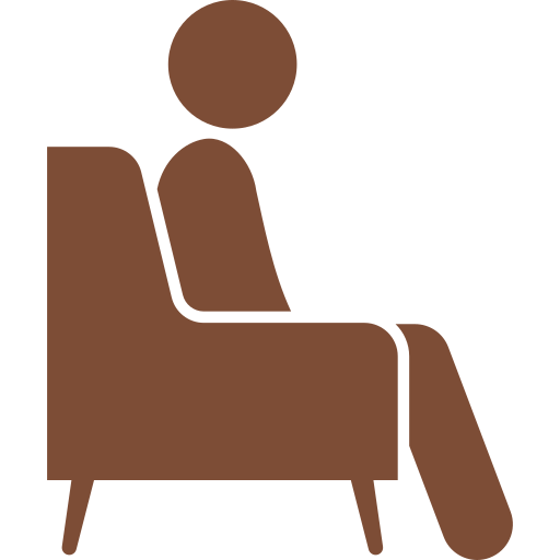 Person sitting on a chair icon representing prolonged sitting or standing increasing rectal pressure.